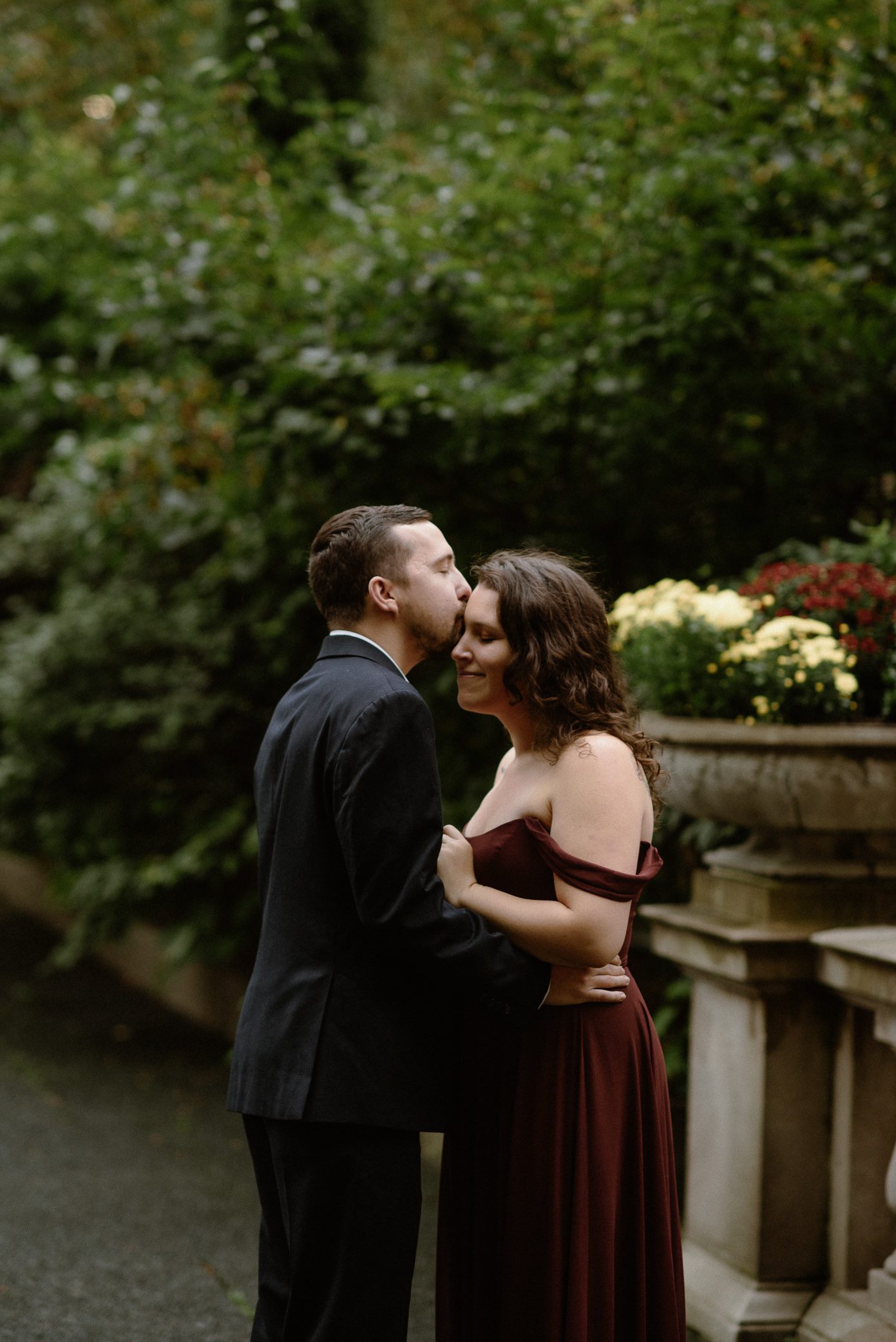 Couple kissing in moody light