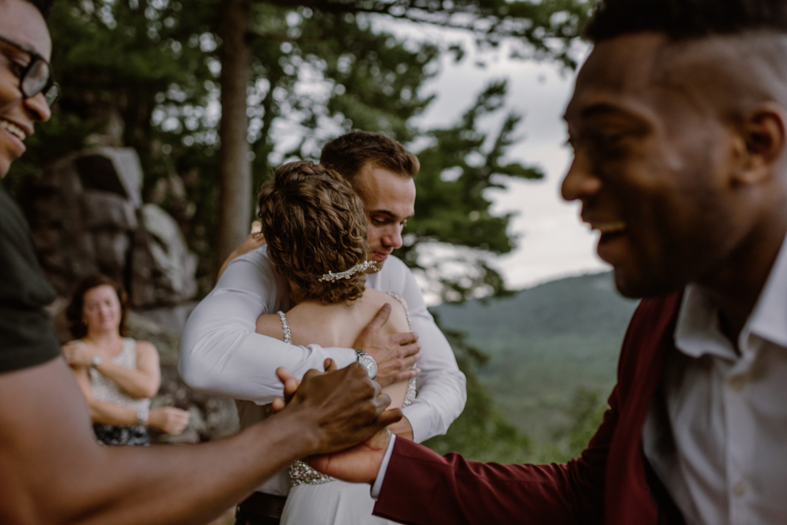 Couple celebrating after their elopement at Devils Lake