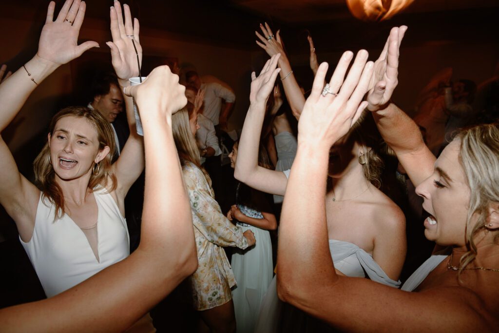 Bride dancing with wedding guests