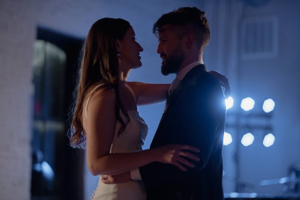 Bride and groom having their first dance while Felix and Fingers play on the pianos.