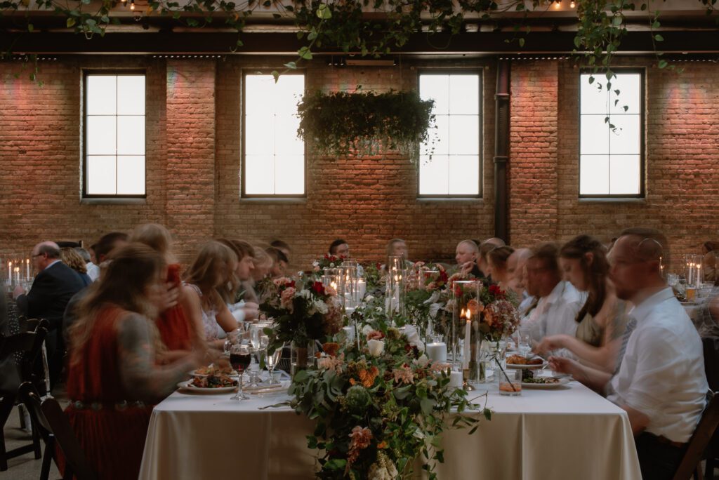 artistic documentary style photos of dinner at wedding
